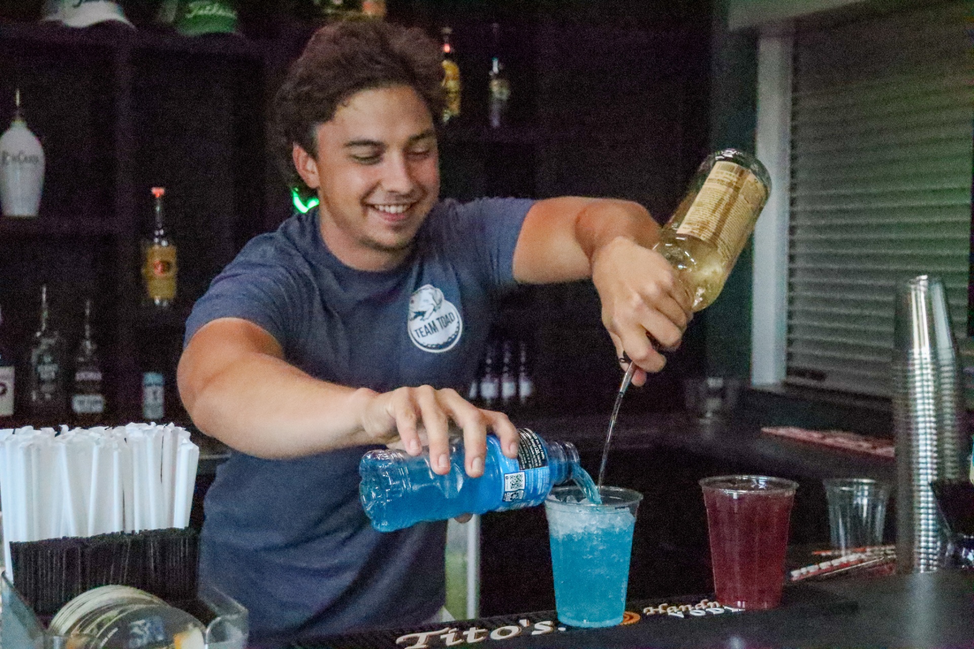 Team Toad bartender mixing a drink at the Flight Zone bar